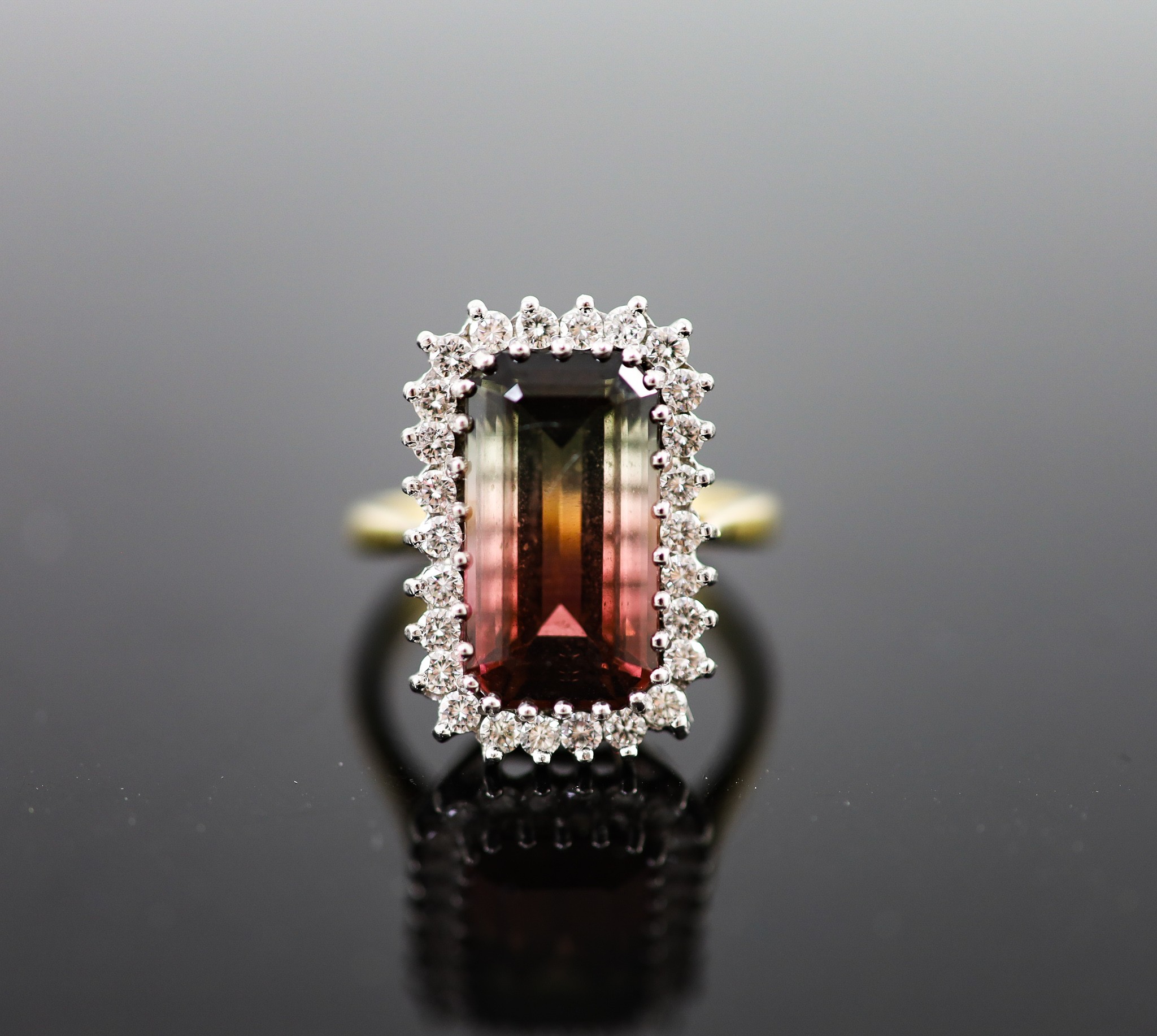 A modern 18ct gold watermelon tourmaline and diamond set rectangular cluster ring
